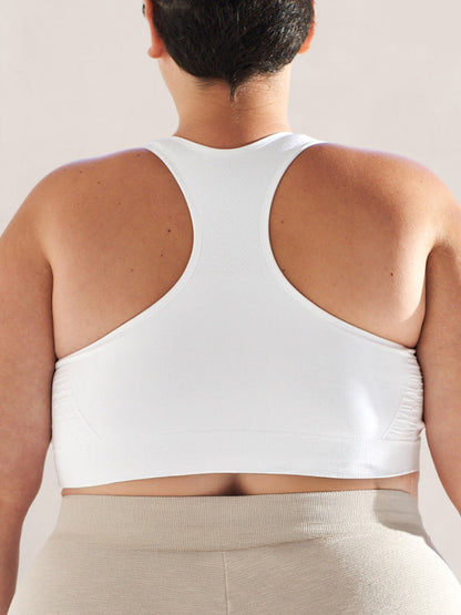 Truekind® Seamless Racerback Sports Bra